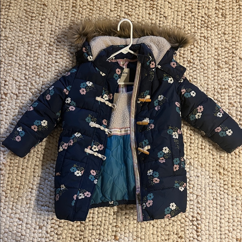 EUC - Mini Boden Floral Puffer Jacket - Navy and Multicolor. The tag says 6-7